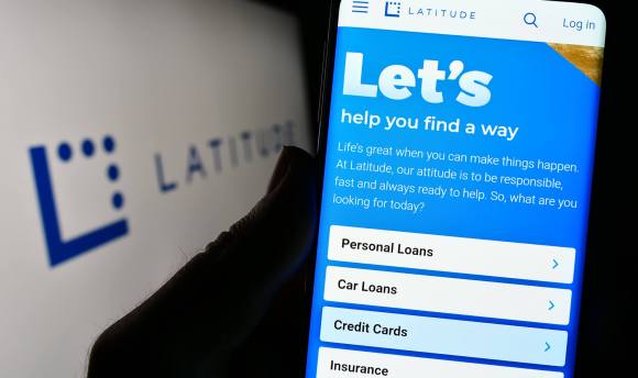 A photo of the Latitude application on a phone being held by someone