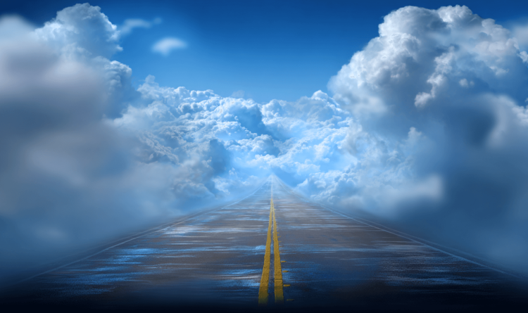 A stylized graphic of a road leaning to beautiful cloud on the horizon
