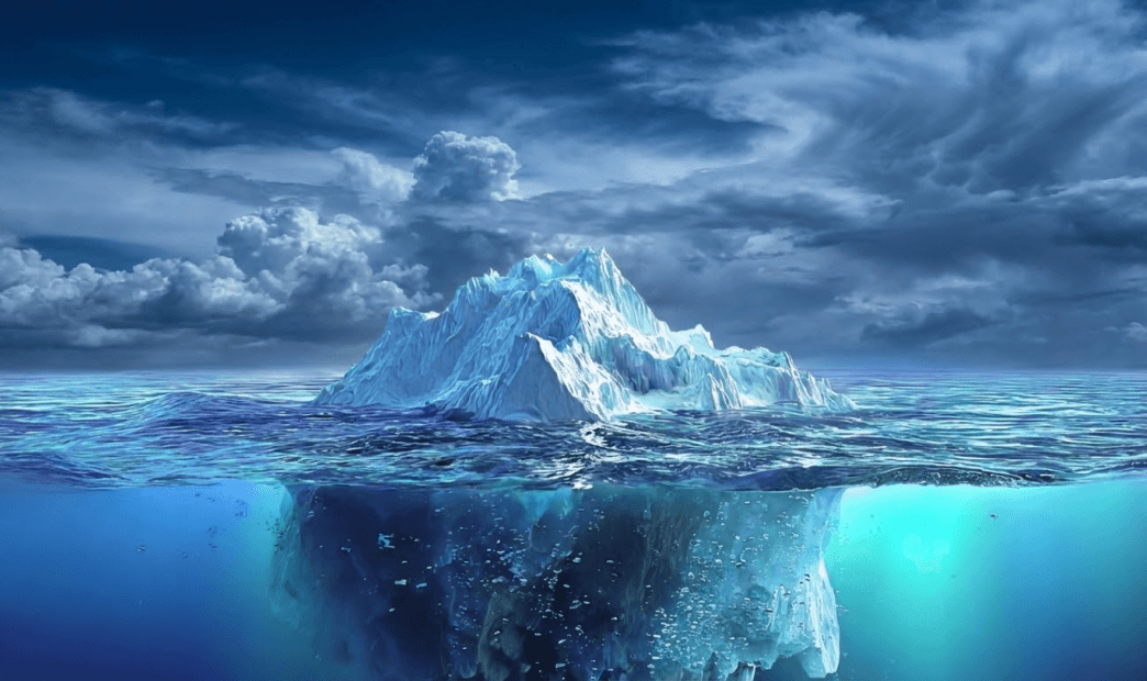 An iceberg floating in deep blue water, illustrating the hidden operational costs and complexities of legacy cloud security tools compared to their visible upfront licensing fees.