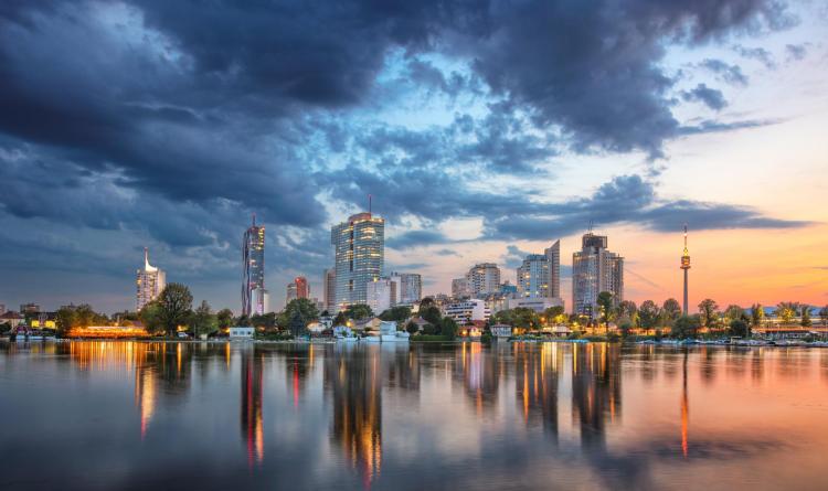 Panoramic cityscape image of Vienna capital city of Austria during sunset.