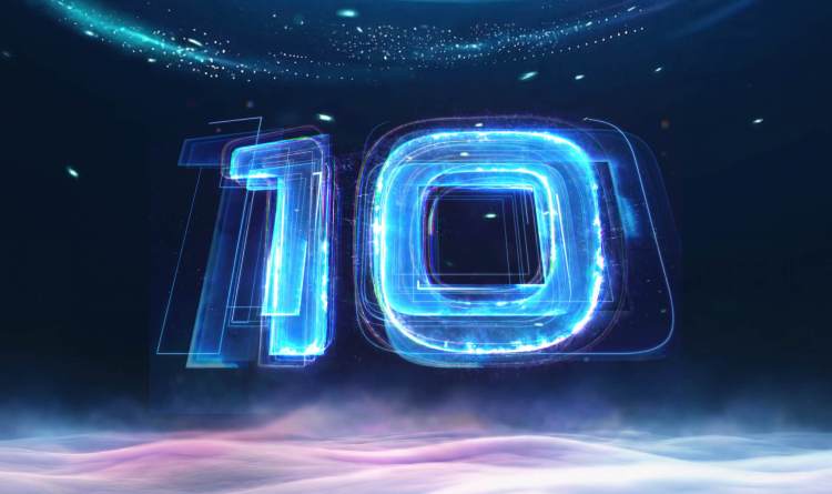 Digital illustration of the number 10 rendered in glowing blue holographic neon light trails over a low layer of clouds.