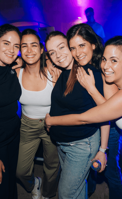 A photo of Orca colleagues at a late-night event
